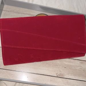 Every lady needs a little red velvet clutch in there life